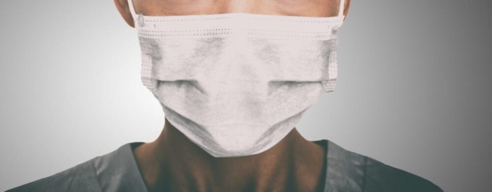 Nurse Who Brings Her Own Mask Fired | Header Image | McOmber McOmber & Luber