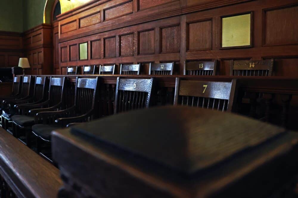 Court Rejects Late Attempt to Compel Employee Allegedly Called N-word to Confidential Arbitration in Racial Discrimination Case | Header Image | McOmber McOmber & Luber