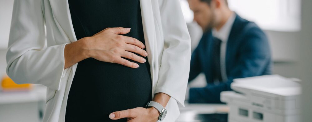 How Can I Support Colleagues Facing Pregnancy Discrimination in the Workplace? | Header Image | McOmber McOmber & Luber