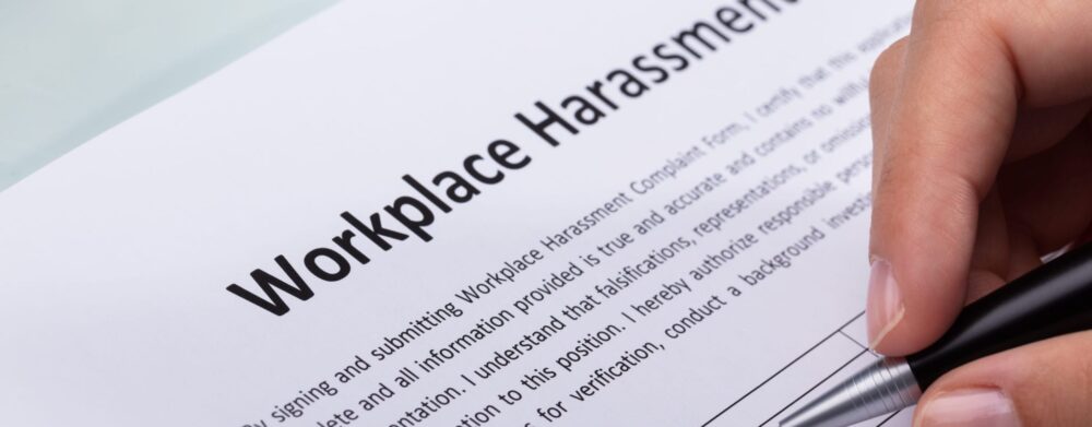 Reporting Harassment: Know Your Rights | Header Image | McOmber McOmber & Luber