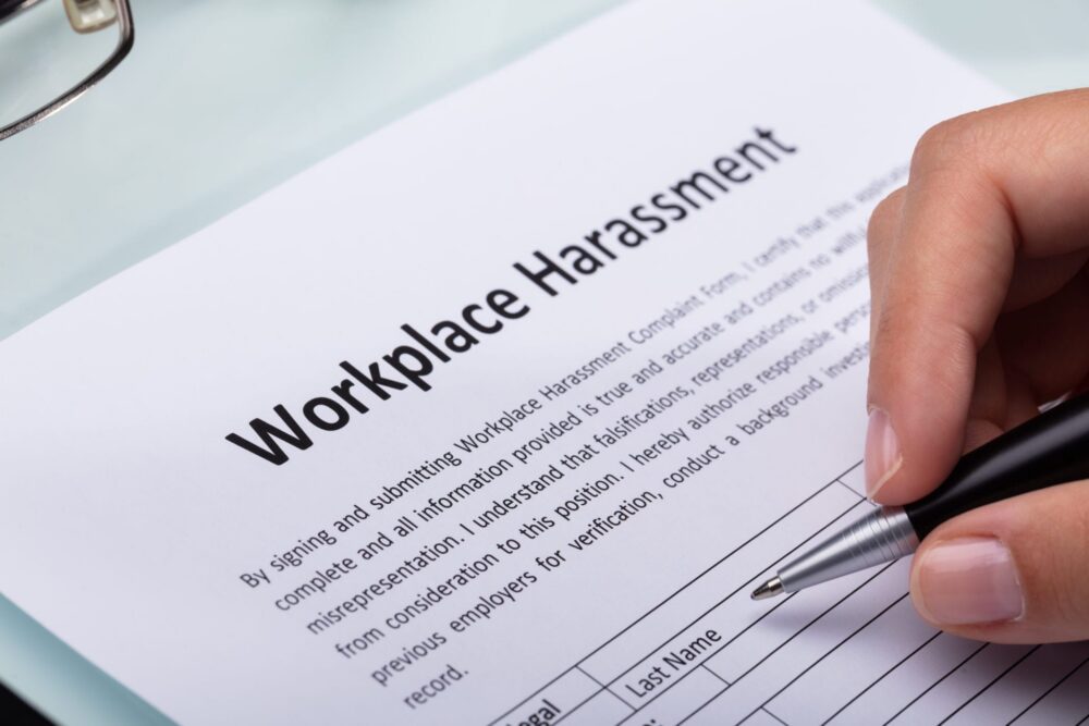 Reporting Harassment: Know Your Rights | Header Image | McOmber McOmber & Luber