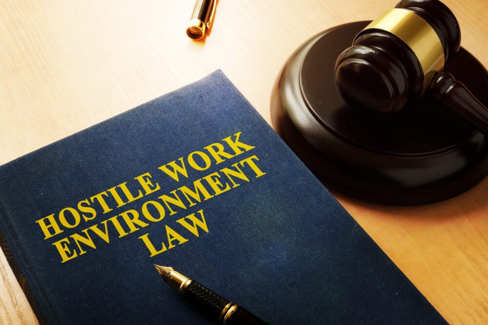 Common Forms of Sexual Harassment: Quid Pro Quo & Hostile Work Environment | Header Image | McOmber McOmber & Luber