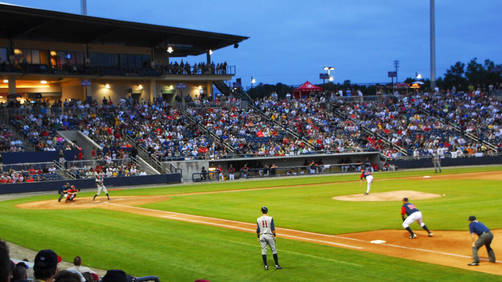 Major League Baseball Agrees to Settlement With Minor League Players Over Pay | Header Image | McOmber McOmber & Luber