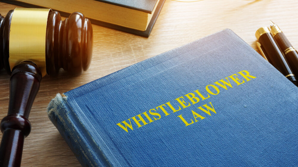 Whistleblower: Rights and Protections | Header Image | McOmber McOmber & Luber
