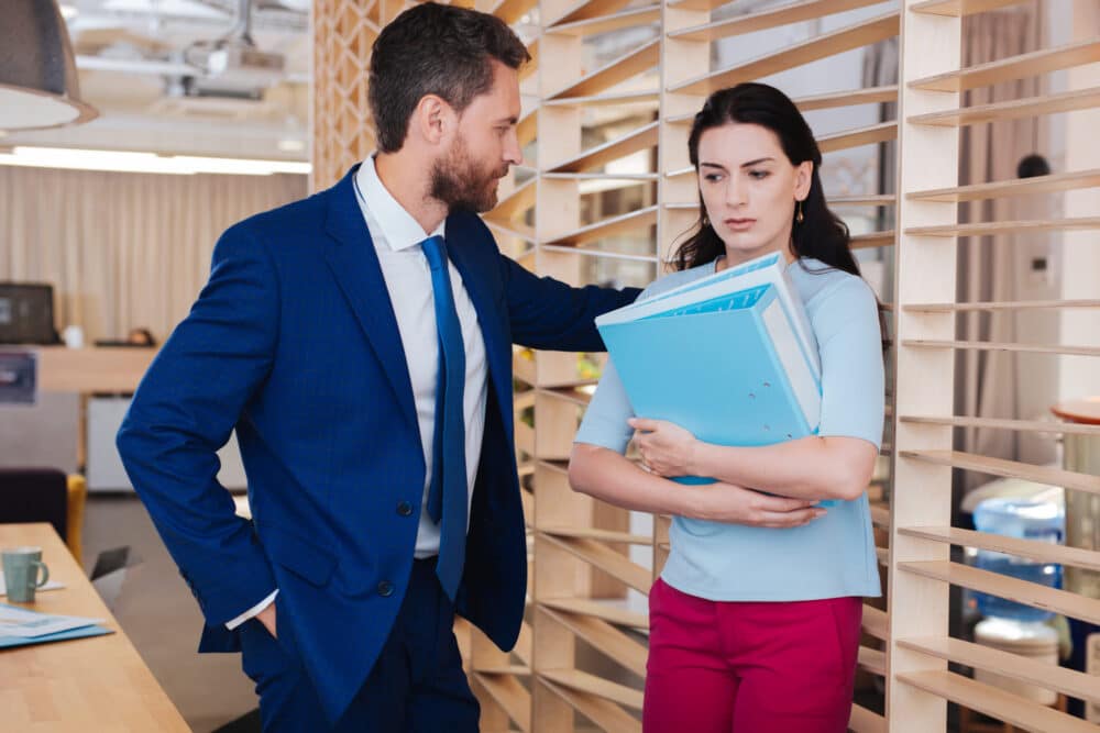 What is Hostile Environment Sexual Harassment and How to Handle It | Header Image | McOmber McOmber & Luber